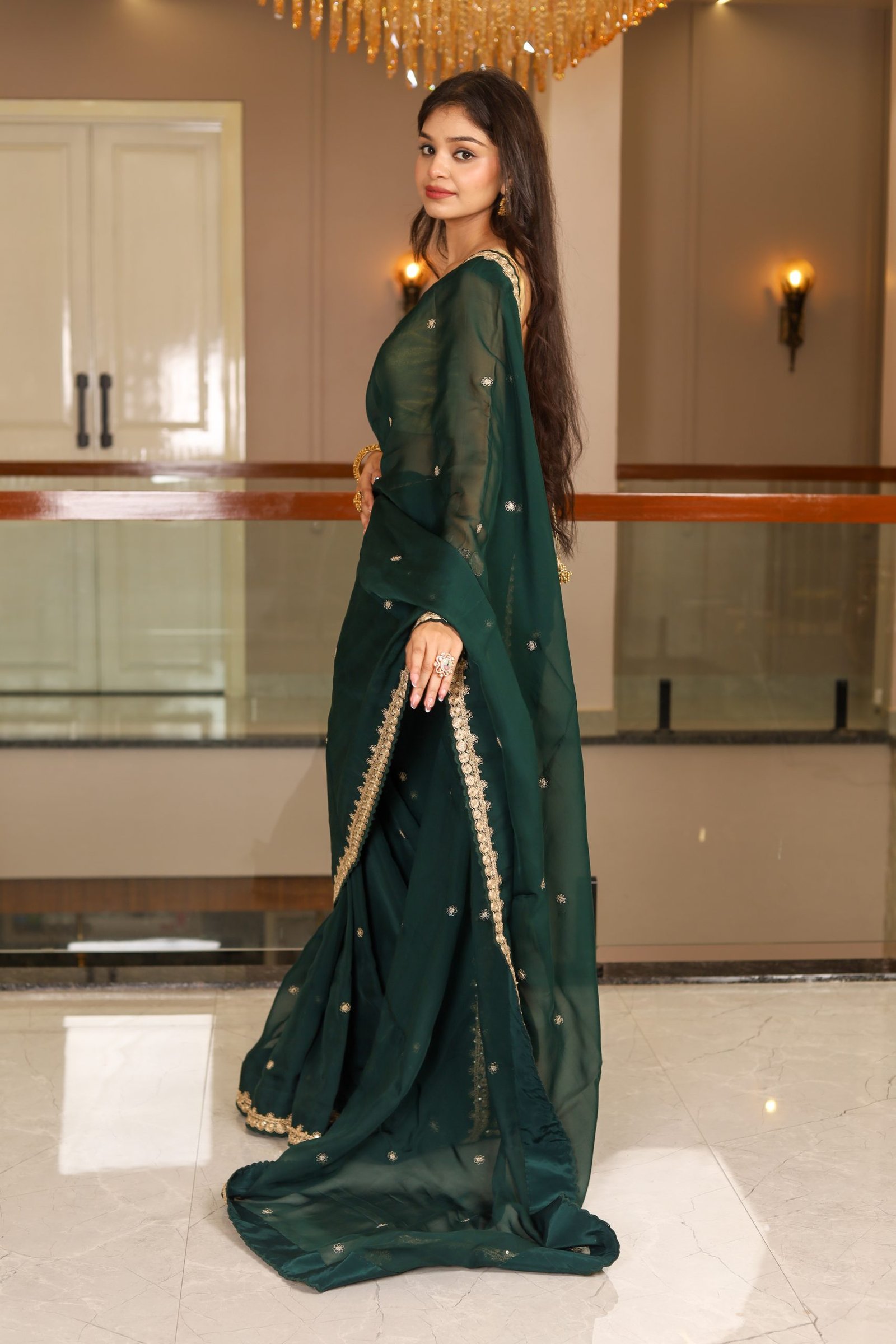 Emerald Grace – Bottle Green Organza Saree with golden embroidery 2